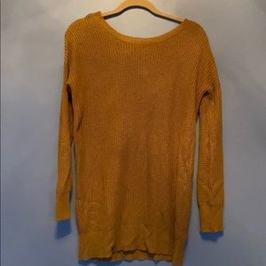 Brown sweater with buckle detail on back